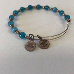 Alex and Ani turquoise looking beaded bracelets.